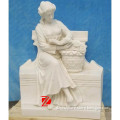stone sitting lady reading statue